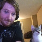 Jason and his cat Terra when she was small