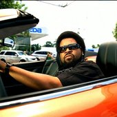 Ice Cube driving Aston Martin