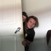 behind open doors