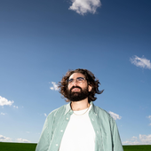 antoine in a grassy field.png