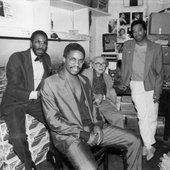 Ron Carter, Hervie Hancock, Max Gordon and Tony Williams relax in the kitchen/dressing room of Gordon's Village Vanguard on September 20, 1985. Mitchell Seidel