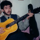 Karwan Osman playing guitar