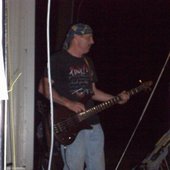 Bassist Bunky Moore backstage tunning up