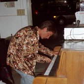 Geoffrey tickles the ivories