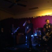 at their second gig (supporting local stoner rock group Shellfin and the Tasmanian hair metal legends Taberah)
