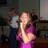Sharon Elaine singing.