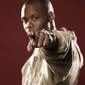 cormega-finger-point-red-bg.jpg