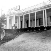 Abner Jay in front of his restaurant