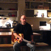 Moby with a guitar