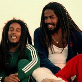 Bob Marley - 46 - with Junior Marvin, Jacob Miller & Chris Blackwell (1980).jpg
