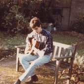 Syd, playing on his backyard bench.