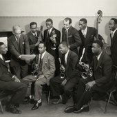 Leroy Smith and his orchestra posing with musical instruments 1945-crop.jpg