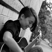 That Certain Jessiquoi with guitar