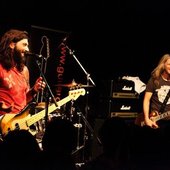 Doug Aldrich(lead guitar) and Michael Devin(bass guitar)