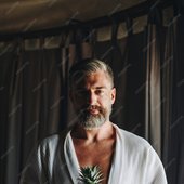man-bathrobe-holding-pineapple_53876-77592.jpg