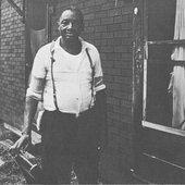 Teddy Darby in front of his East St. Louis home.jpg