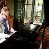 Playing Bread of Angels at the grand piano,June 23,2011 CD Release Party