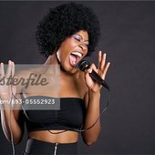 693-05552923em-woman-singing-on-microphone-over-colored-background-stock-photo.jpg