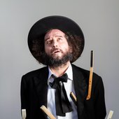 Capossela-696x1044.jpg