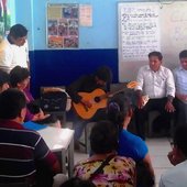 Percy Aleksander playing for teachers