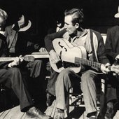 Frank Proffitt with a guitar c. 1940 in Beech Mountain, N.C..jpg