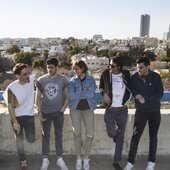 Standing on rooftops