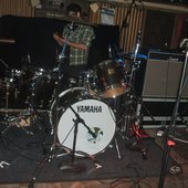 Dane setting up his drum kit in The Cellar