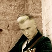 Salmi (Vocals/ Guitar)