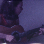 Sibylle playing guitar
