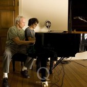 Clint and Cullum playing piano