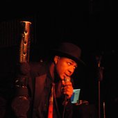 Xtevion onstage with the \"big black stick\"
