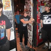 The vocalist of Trench Rot having to sing from outside the venue, because he’s under 21.