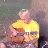Tom playing guitar