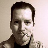Profile of Keane Douglas Wren w/ cig
