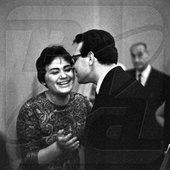 Laureates of the third international Tchaikovsky contest of musicians and performers Maria Biesu (left) and Vladimir Atlantov congratulate each other.