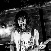 playing bass for serial killer glasses