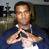 Kanye throwing up the diamond
