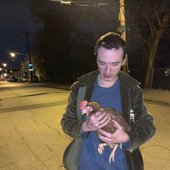 arthur holding the dog that inspired woof woof