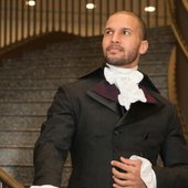 The King posing clad in Hamilton costume.