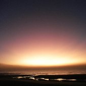 The sun seting behind the horision of the sea (hear track Srimati Radharani)
