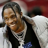 travis-scott-smiles-at-nba-game-while-kylie-jenner-stays-at-home-with-stormi-ftr.jpg