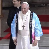 Pope Francis wearing a custom traditional anime coat that he was gifted while in Japan.jpg
