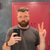 Sparky looking a bit dissapointed in a bathroom mirror