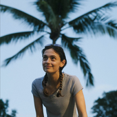 Dev Lemons in front of a palm tree