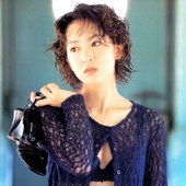 穴井夕子