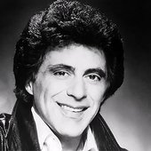 Frankie-Valli-c-1976-MCA-Records-Curb-Records-press-photo-eBay-no-visible-copyright-front-or-back-public-domain-cropped-flipped.jpg