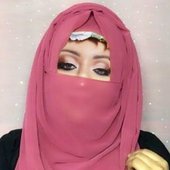 MrsQueenKrasavice wearing a Christian Dior hijab.