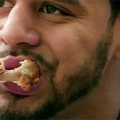J. Cole eating chicken