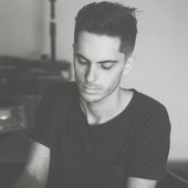 capital. writing music in his kitchen