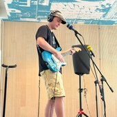 Alex Sitze plays at Milwaukee Public Library - East Branch